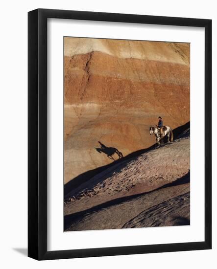 Rider with Shadow Coming down Hill in Painted Desert-Terry Eggers-Framed Photographic Print