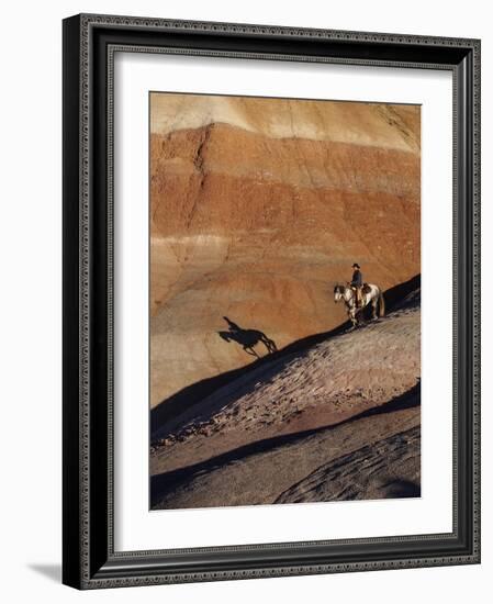 Rider with Shadow Coming down Hill in Painted Desert-Terry Eggers-Framed Photographic Print