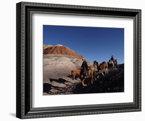 Riders and Horses with Shadows Coming down Hill in Painted Desert-Terry Eggers-Framed Photographic Print