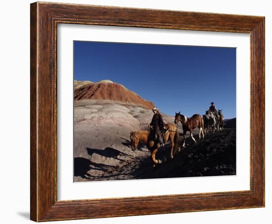 Riders and Horses with Shadows Coming down Hill in Painted Desert-Terry Eggers-Framed Photographic Print