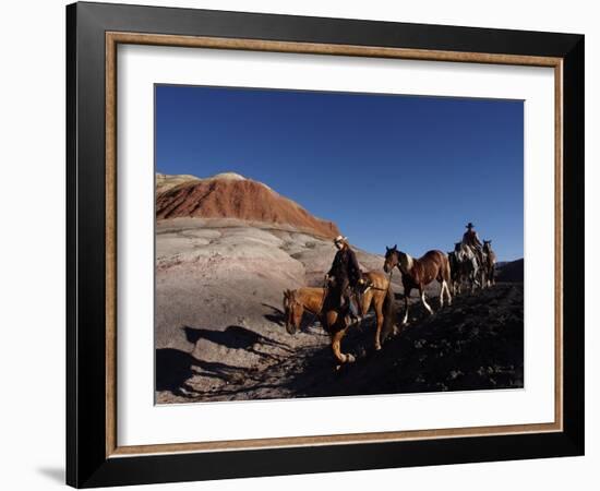 Riders and Horses with Shadows Coming down Hill in Painted Desert-Terry Eggers-Framed Photographic Print