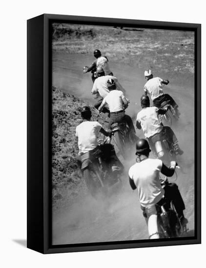 Riders Enjoying Motorcycle Racing, Leaving a Trail of Dust Behind-Loomis Dean-Framed Premier Image Canvas