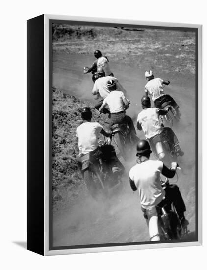 Riders Enjoying Motorcycle Racing, Leaving a Trail of Dust Behind-Loomis Dean-Framed Premier Image Canvas