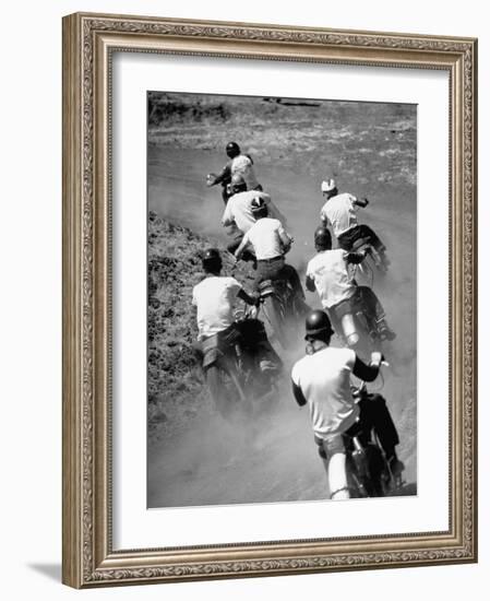 Riders Enjoying Motorcycle Racing, Leaving a Trail of Dust Behind-Loomis Dean-Framed Photographic Print