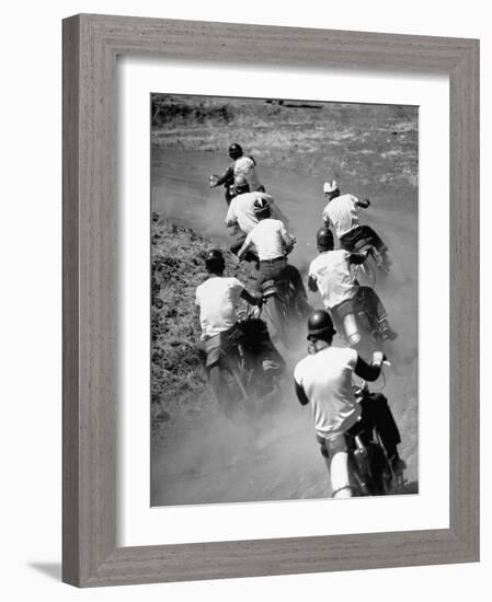 Riders Enjoying Motorcycle Racing, Leaving a Trail of Dust Behind-Loomis Dean-Framed Photographic Print