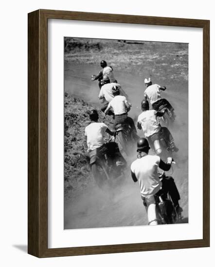 Riders Enjoying Motorcycle Racing, Leaving a Trail of Dust Behind-Loomis Dean-Framed Photographic Print