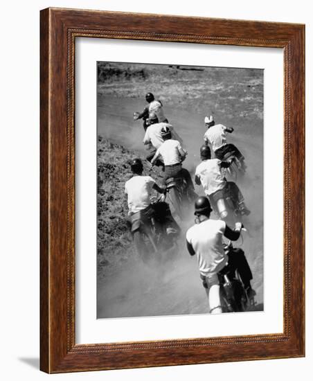 Riders Enjoying Motorcycle Racing, Leaving a Trail of Dust Behind-Loomis Dean-Framed Photographic Print