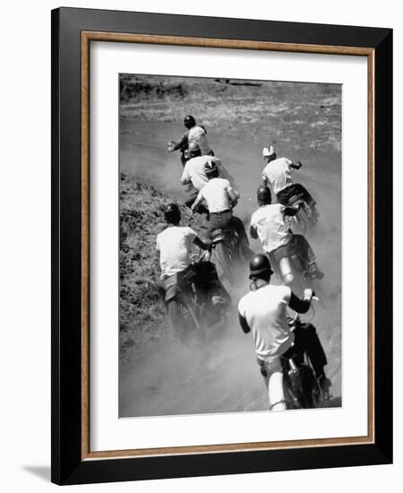 Riders Enjoying Motorcycle Racing, Leaving a Trail of Dust Behind-Loomis Dean-Framed Photographic Print