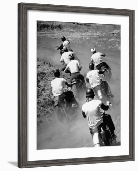 Riders Enjoying Motorcycle Racing, Leaving a Trail of Dust Behind-Loomis Dean-Framed Photographic Print