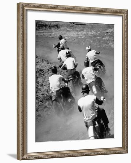 Riders Enjoying Motorcycle Racing, Leaving a Trail of Dust Behind-Loomis Dean-Framed Photographic Print