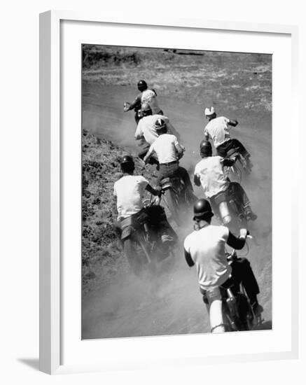 Riders Enjoying Motorcycle Racing, Leaving a Trail of Dust Behind-Loomis Dean-Framed Photographic Print