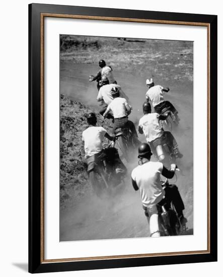 Riders Enjoying Motorcycle Racing, Leaving a Trail of Dust Behind-Loomis Dean-Framed Photographic Print