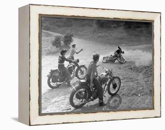 Riders Enjoying Motorcycle Riding, with One Taking a Spill-Loomis Dean-Framed Premier Image Canvas