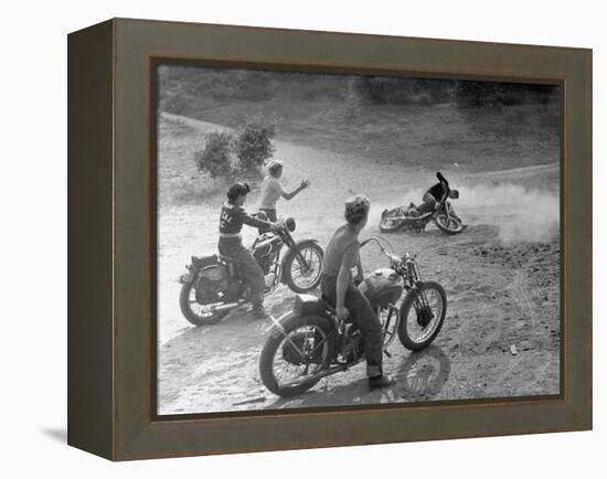 Riders Enjoying Motorcycle Riding, with One Taking a Spill-Loomis Dean-Framed Premier Image Canvas