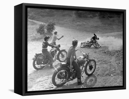 Riders Enjoying Motorcycle Riding, with One Taking a Spill-Loomis Dean-Framed Premier Image Canvas