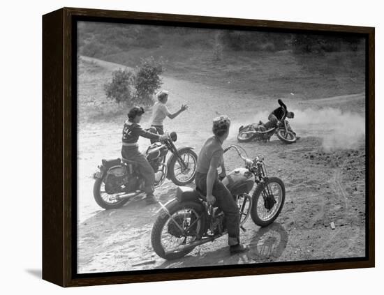 Riders Enjoying Motorcycle Riding, with One Taking a Spill-Loomis Dean-Framed Premier Image Canvas