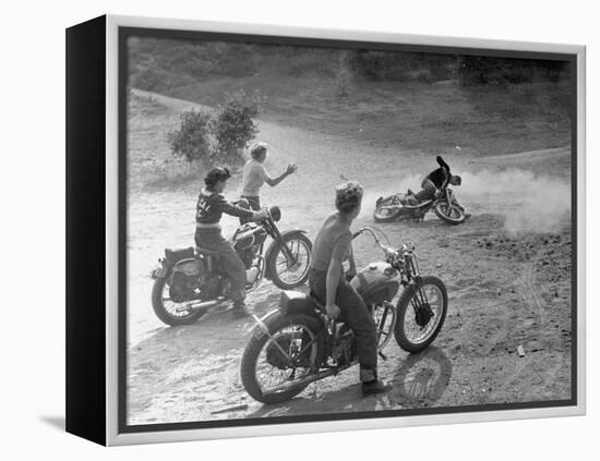 Riders Enjoying Motorcycle Riding, with One Taking a Spill-Loomis Dean-Framed Premier Image Canvas