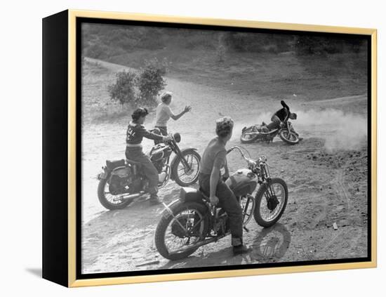 Riders Enjoying Motorcycle Riding, with One Taking a Spill-Loomis Dean-Framed Premier Image Canvas