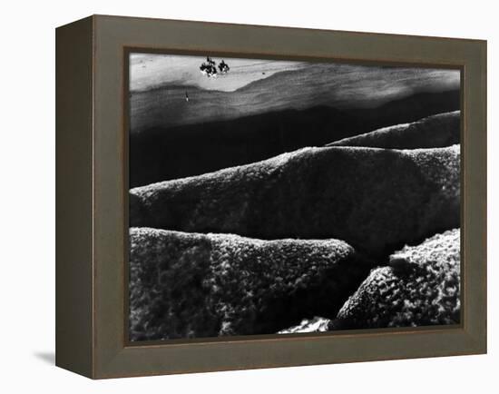 Riders Guiding their Horses Along the Shore as Mountainous Waves of High Tide Roll Shoreward-Margaret Bourke-White-Framed Premier Image Canvas