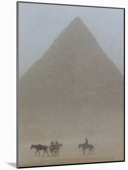 Riders in sandstorm. Pyramids of Giza, Egypt.-Tom Norring-Mounted Photographic Print