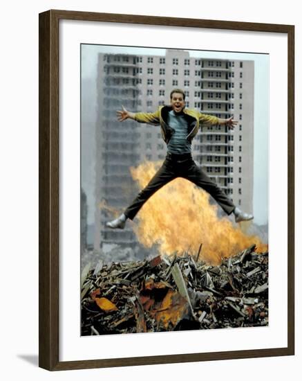 Riff Leaps over Smoldering Rubble of New York Slum Clearance Project in Scene from West Side Story-Gjon Mili-Framed Premium Photographic Print