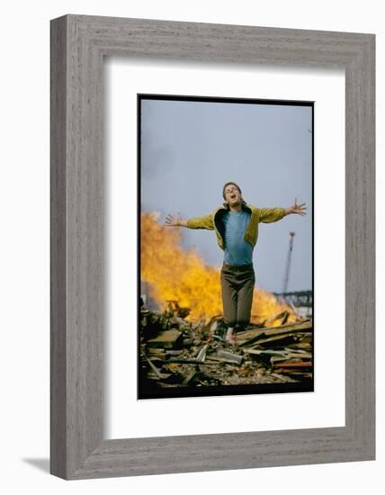 Riff Leaps over Smoldering Rubble, Scene from West Side Story-Gjon Mili-Framed Photographic Print