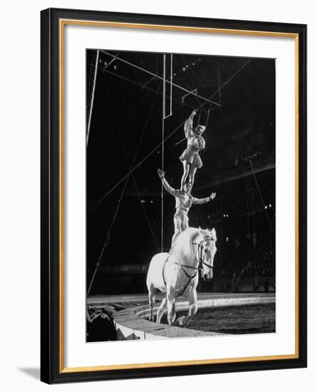 Ringling Brothers' Barnum and Bailey Circus Performers Riding on Back of Horse-Ralph Morse-Framed Photographic Print