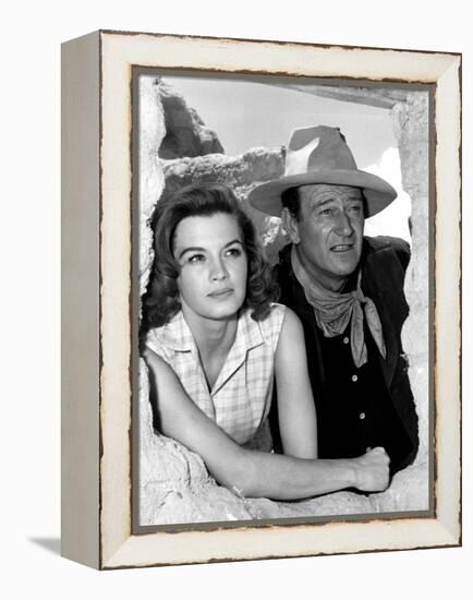 RIO BRAVO, 1959 directed by HOWARD HAWKS On the set, Angie Dickinson and John Wayne (b/w photo)-null-Framed Stretched Canvas