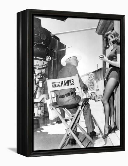 RIO BRAVO, 1959 directed by HOWARD HAWKS On the set, Hohard Hawks directs Angie Dickinson (b/w phot-null-Framed Stretched Canvas