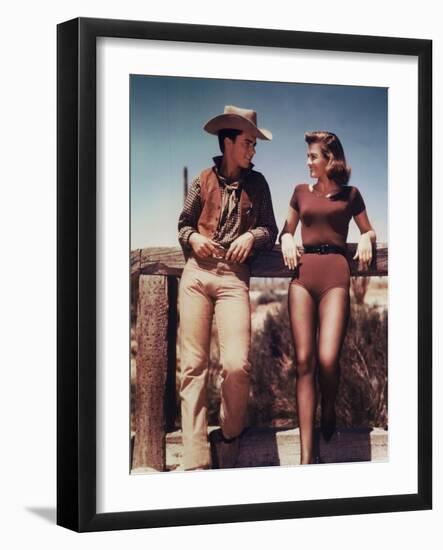 RIO BRAVO, 1959 directed by HOWARD HAWKS On the set, Ricky Nelson and Angie Dickinson (photo)--Framed Photo