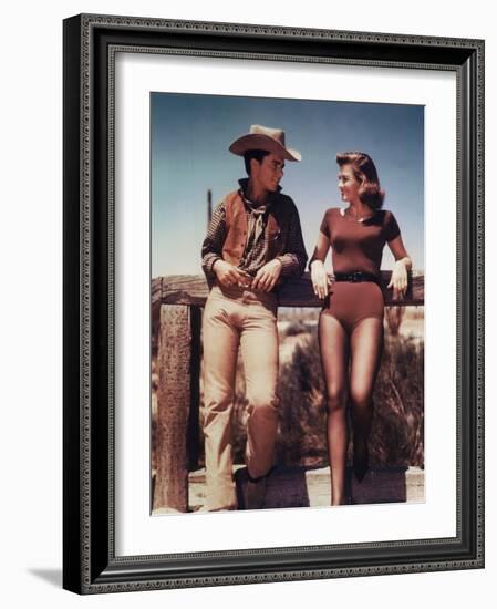 RIO BRAVO, 1959 directed by HOWARD HAWKS On the set, Ricky Nelson and Angie Dickinson (photo)-null-Framed Photo