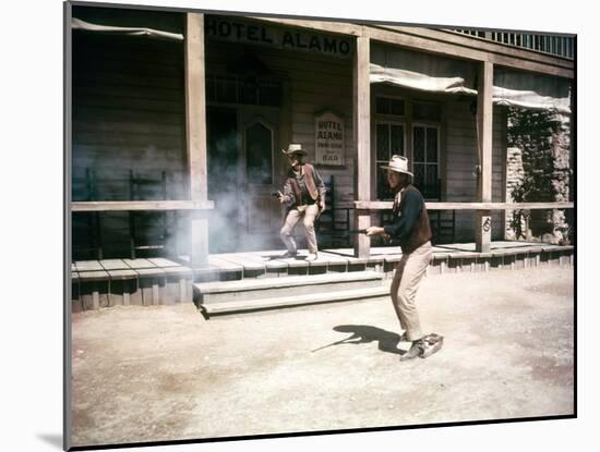 RIO BRAVO, 1959 directed by HOWARD HAWKS Ricky Nelson and John Wayne (photo)-null-Mounted Photo