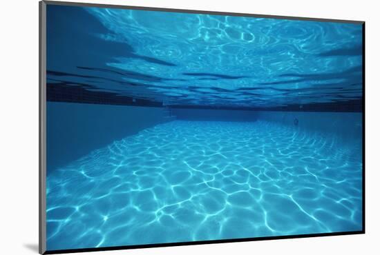 Rippling Water in Swimming Pool-Rick Doyle-Mounted Photographic Print