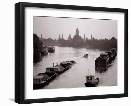 River Barges Coming Down on Chao Phraya River with a View of Wat Chaiwatthanaram, 1980-null-Framed Photographic Print