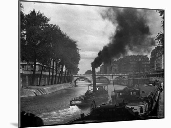 River Boat Smoke Passes along the River Seine-Andreas Feininger-Mounted Photographic Print