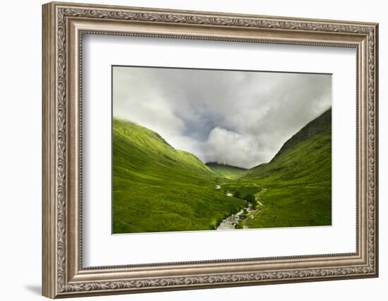 River Flowing through a Valley in the Scottish Highlands, the Mountains are Covered in Clouds-unkreatives-Framed Photographic Print