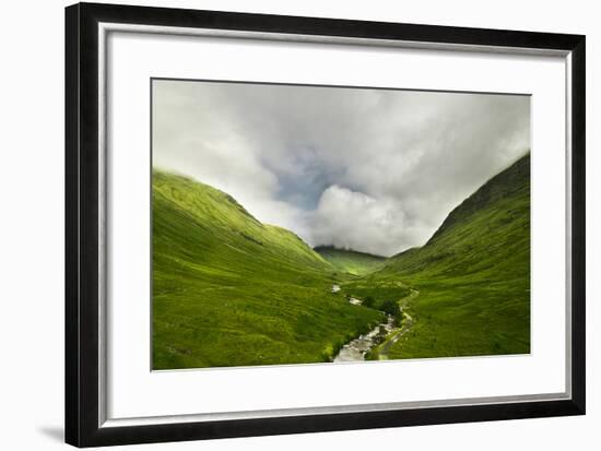 River Flowing through a Valley in the Scottish Highlands, the Mountains are Covered in Clouds-unkreatives-Framed Photographic Print