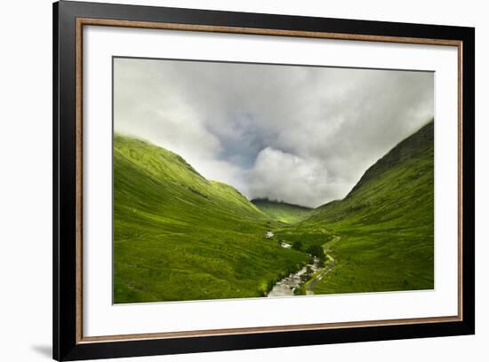 River Flowing through a Valley in the Scottish Highlands, the Mountains are Covered in Clouds-unkreatives-Framed Photographic Print