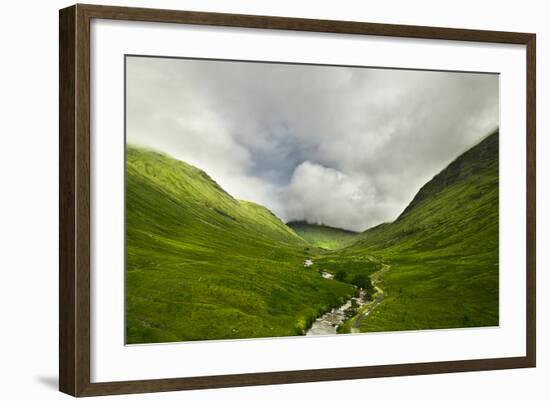 River Flowing through a Valley in the Scottish Highlands, the Mountains are Covered in Clouds-unkreatives-Framed Photographic Print