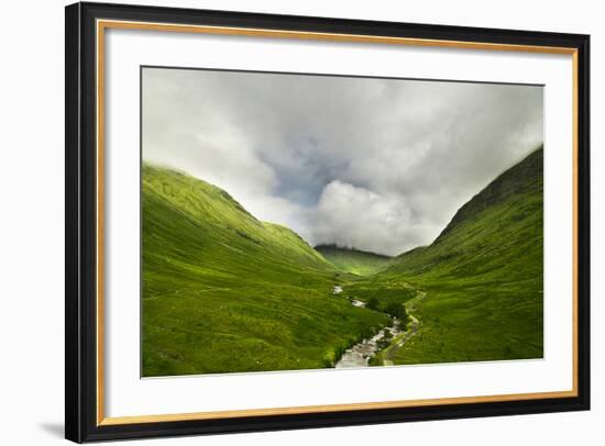 River Flowing through a Valley in the Scottish Highlands, the Mountains are Covered in Clouds-unkreatives-Framed Photographic Print