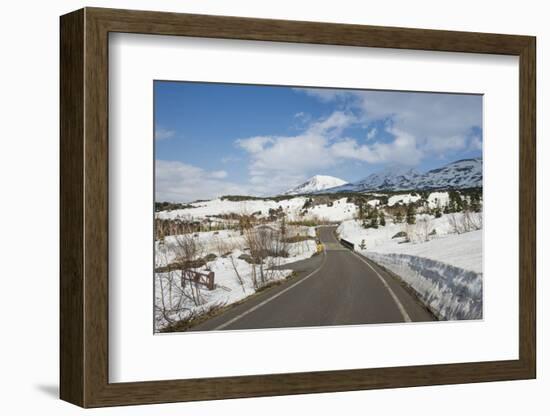 Road leading through the snow capped mountains of the Daisetsuzan National Park, UNESCO World Herit-Michael Runkel-Framed Photographic Print