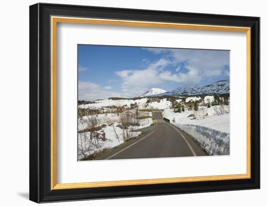 Road leading through the snow capped mountains of the Daisetsuzan National Park, UNESCO World Herit-Michael Runkel-Framed Photographic Print