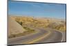 Road Swings Through the Badlands National Park, South Dakota, Usa-Michael Runkel-Mounted Photographic Print