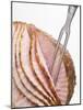 Roast Ham, Partly Carved, with Carving Fork-null-Mounted Photographic Print