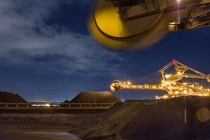 An Automated Bucket-Wheel Excavator Loads Coal into Ships Bound for China and India by Robb Kendrick