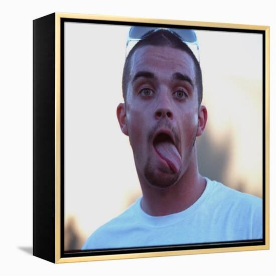 Robbie Williams Sticking His Tongue Out to Photographers at T in the Park Festival-null-Framed Premier Image Canvas