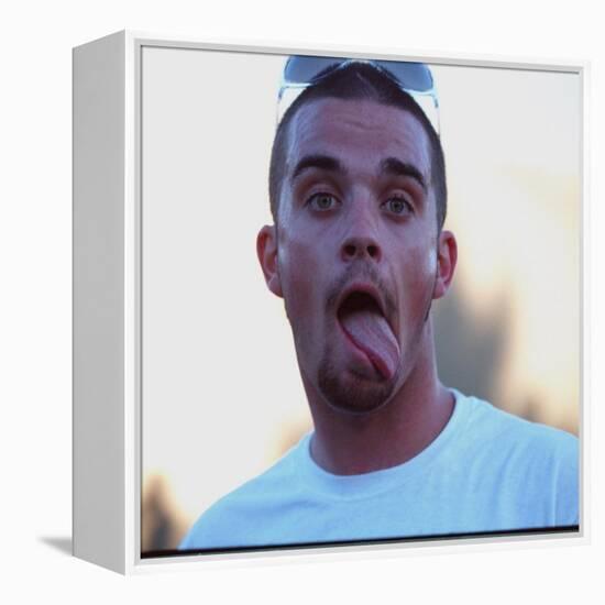 Robbie Williams Sticking His Tongue Out to Photographers at T in the Park Festival-null-Framed Premier Image Canvas