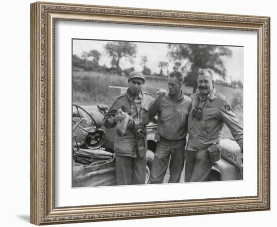 Robert Capa (Left) and Ernest Hemingway (Right) with their Driver U.S. Army Driver-null-Framed Photo