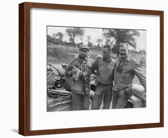 Robert Capa (Left) and Ernest Hemingway (Right) with their Driver U.S. Army Driver-null-Framed Photo