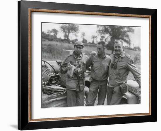 Robert Capa (Left) and Ernest Hemingway (Right) with their Driver U.S. Army Driver-null-Framed Photo